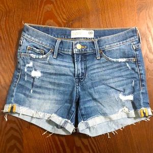 Low-Rise Pre-Torn Denim Shorts
